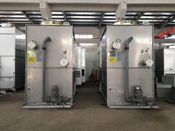 Side view of two finished counter flow closed circuit cooling towers / fluid coolers